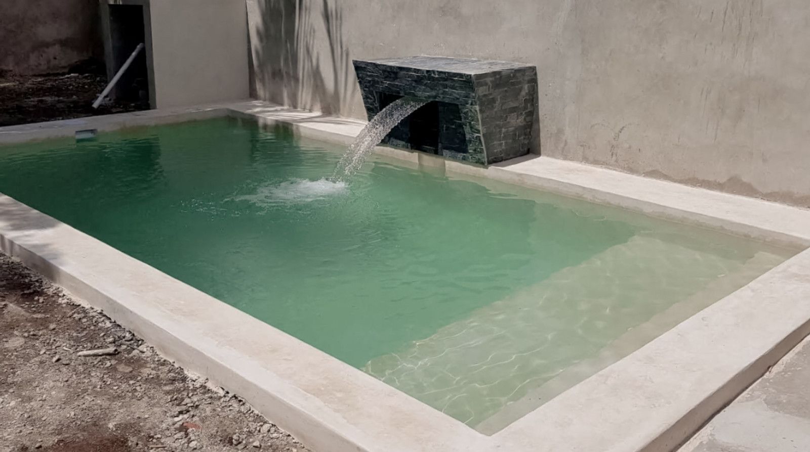 Piscina com acabamento em Chukum - 15